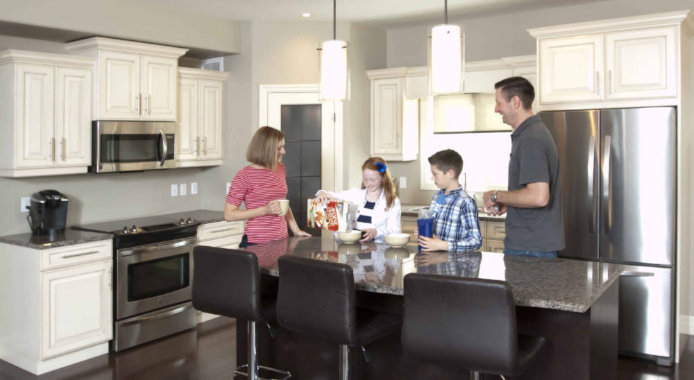 family in Settlers Ridge kitchen
